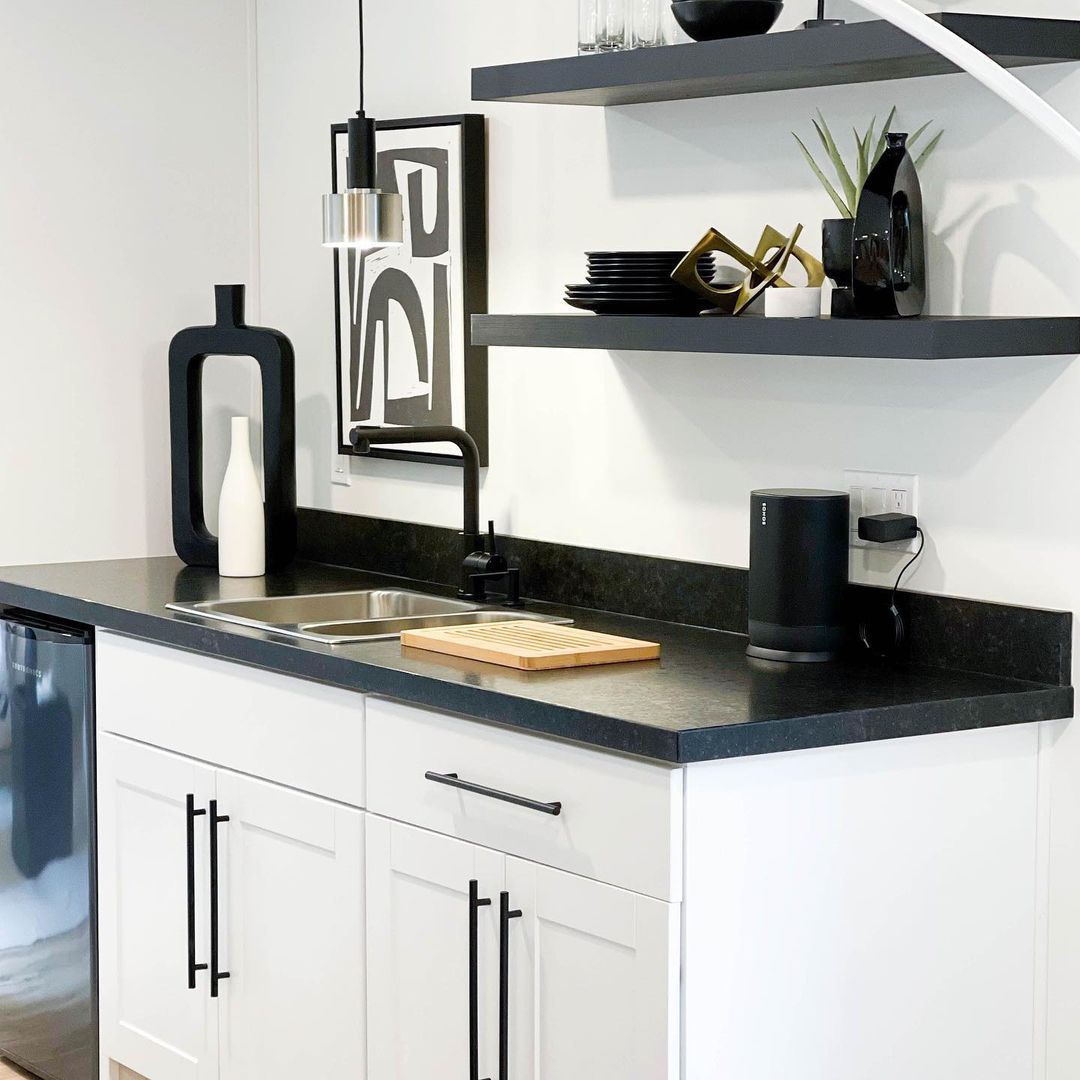 dark granite paired with light-colored cabinetry