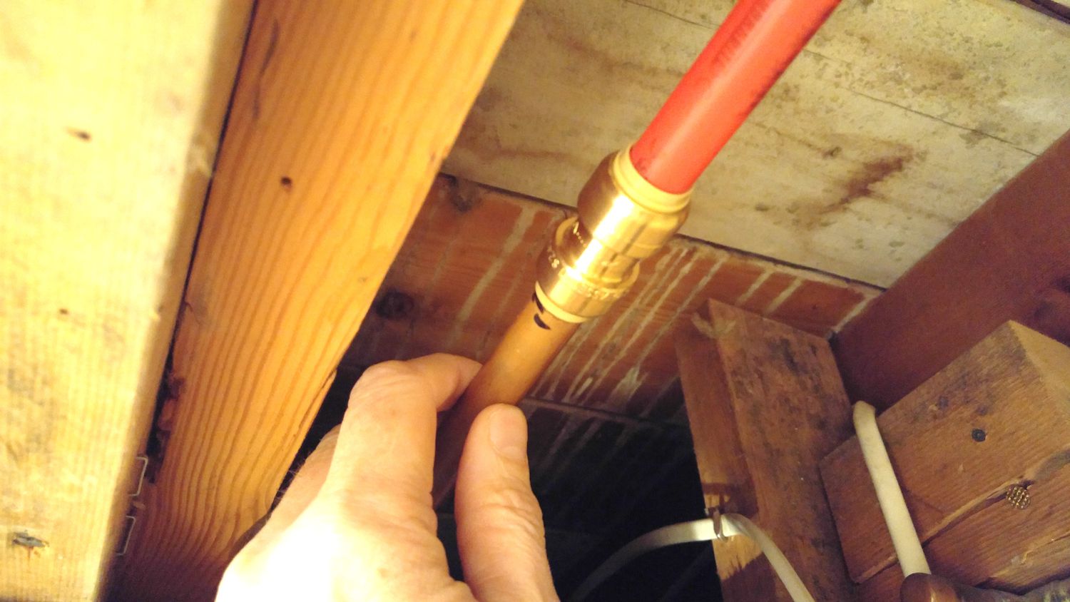 Join both ends of the copper pipe with PEX tubing.