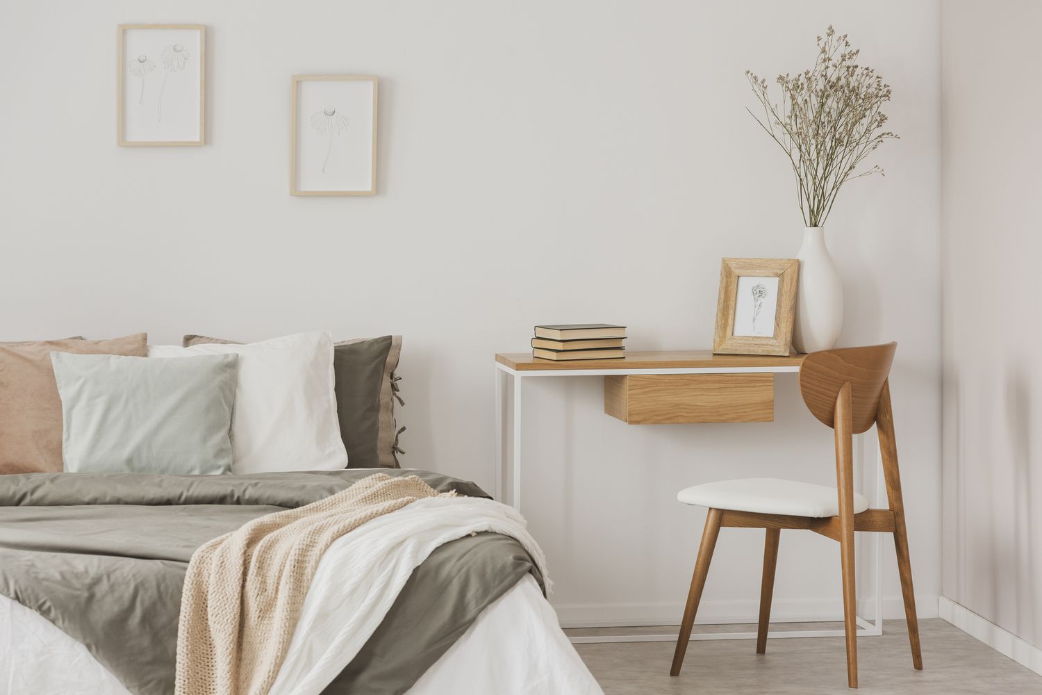 cozy bedroom featuring a workspace