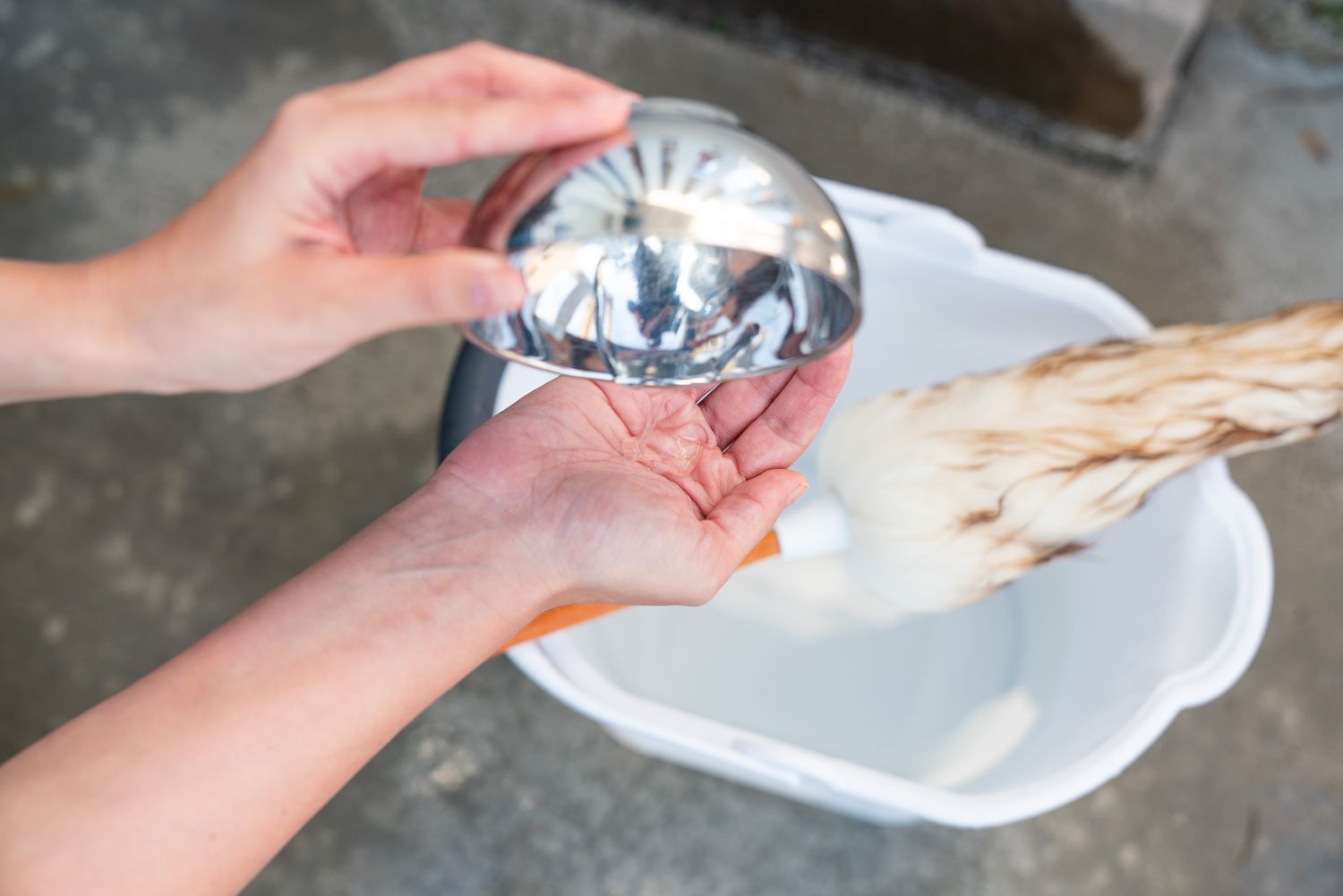 Glycerin drizzled onto hands while using a wool duster.