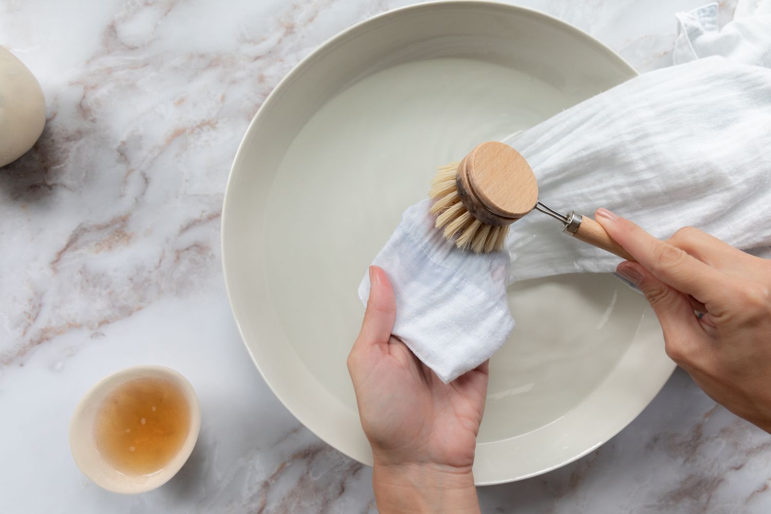 gently brushing the stain with a soft-bristled brush