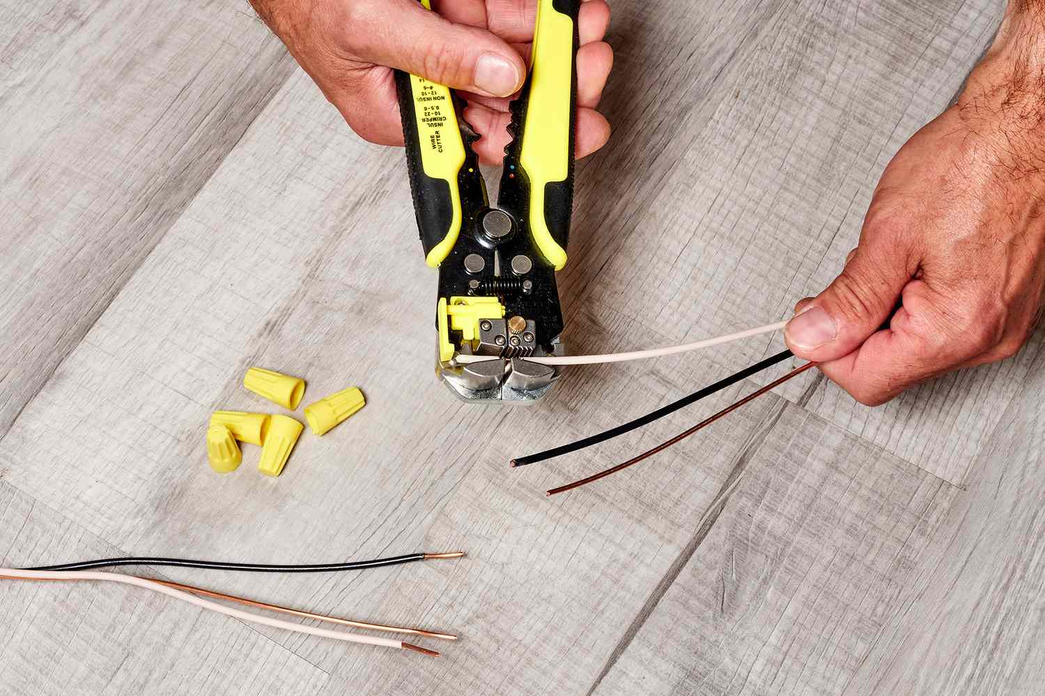 Use wire strippers to remove insulation from the ends of the wire, exposing 1/2 to 3/4 inch of the conductor.